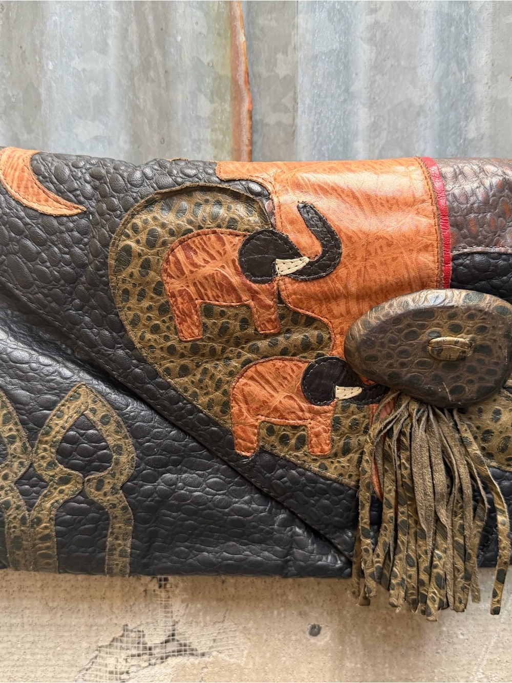 Elephant Appliqué Leather Clutch in Black and Brown